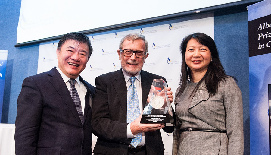 Alex Matter poses with the Szent-Gyorgyi Prize for Progress in Cancer Research