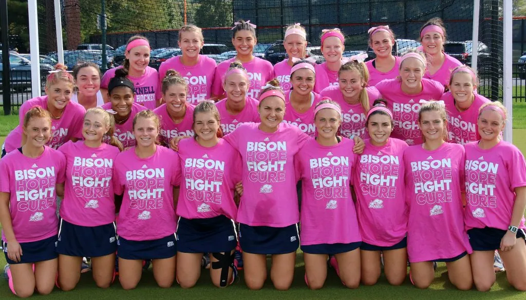 Bucknell Field Hockey Play4TheCure in their classic 'Hope Fight Cure' pink shirts Bucknell Field hockey in their Pink Play4TheCure Shirts