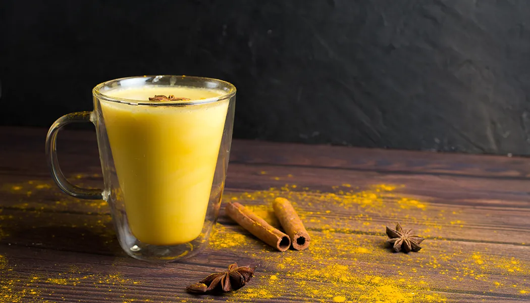 Golden,Milk,Turmeric,Latte,With,Turmeric,Powder,And,Ingredients,In