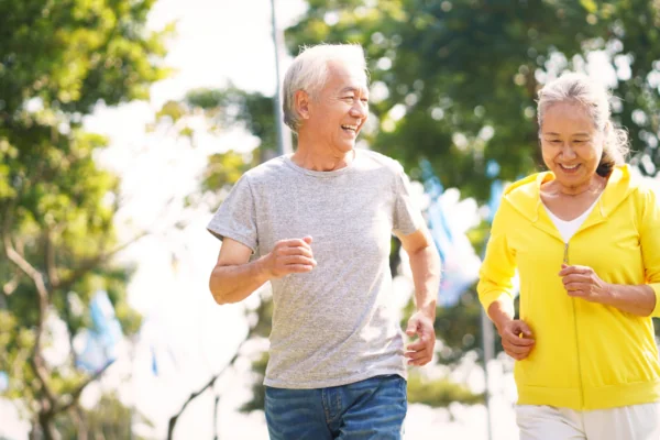 Older Couple Jogs together