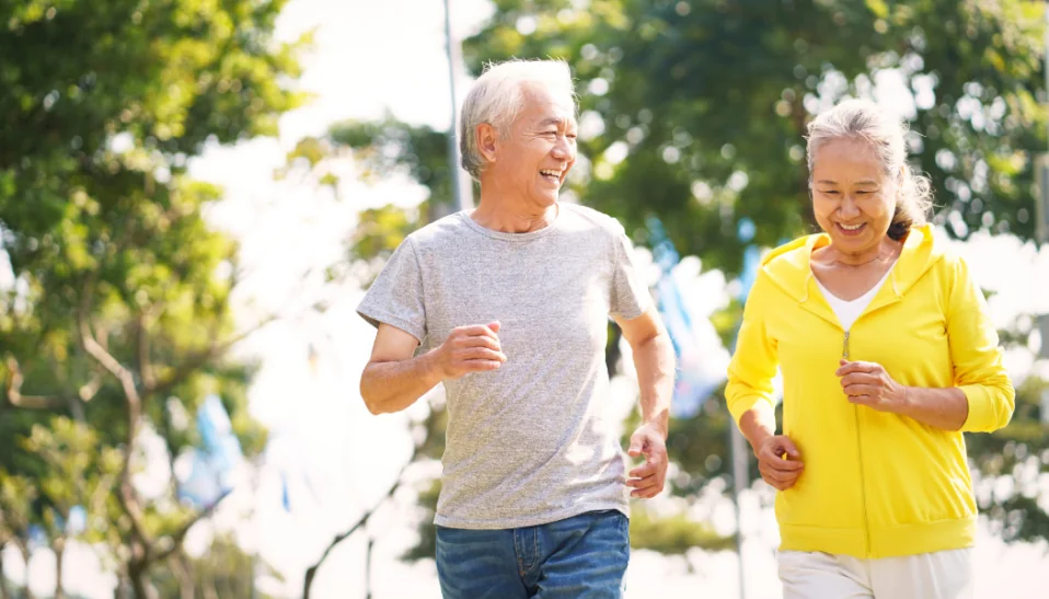 Older Couple Jogs together