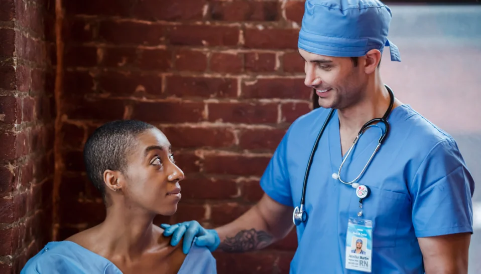 Doctor comforts and informs patient