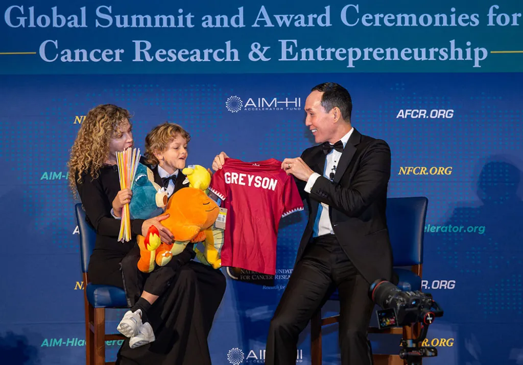 Katie and Greyson Banovich with Lance Kawaguchi